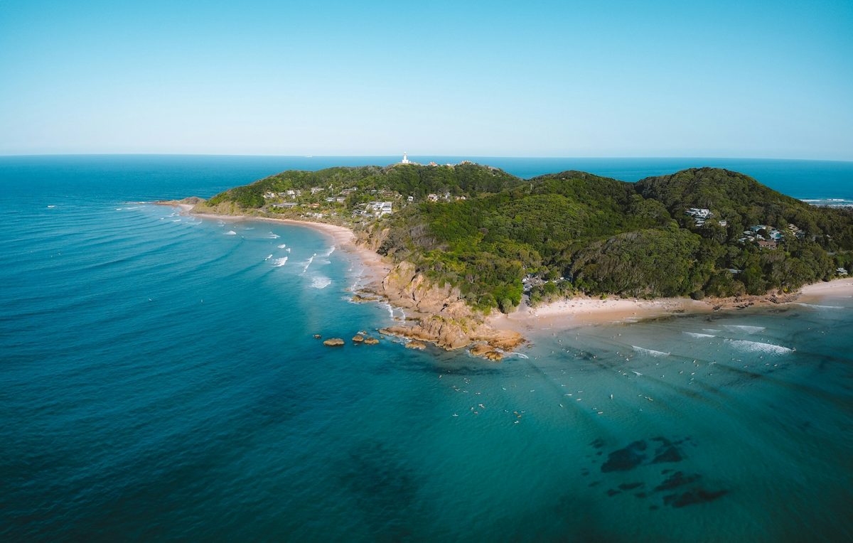 Aerial view of Cape Byron and the turquoise water of Byron Bay
