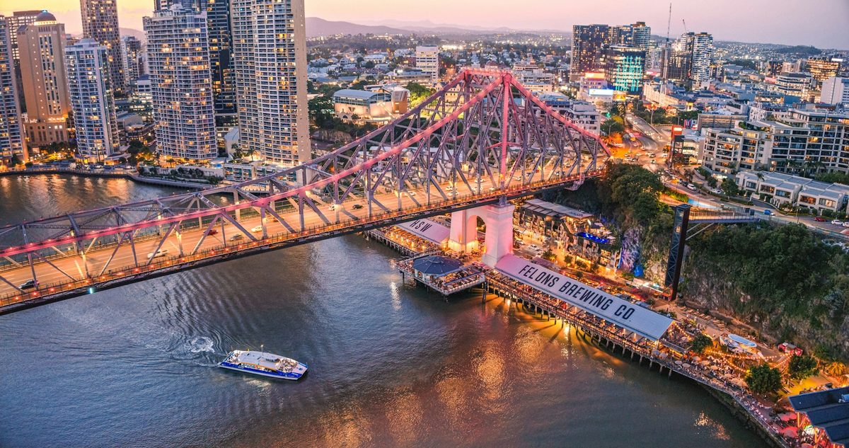 The Story Bridge and Howard Smith Wharves lit up at dusk