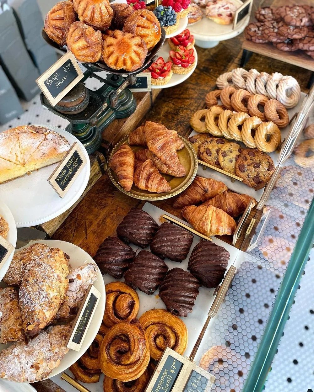 Croissants, doughnuts, tarts and pastries on the counter at Tarte Beach House
