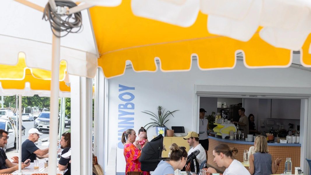 Sunnyboy Espresso's yellow awning and busy coffee window