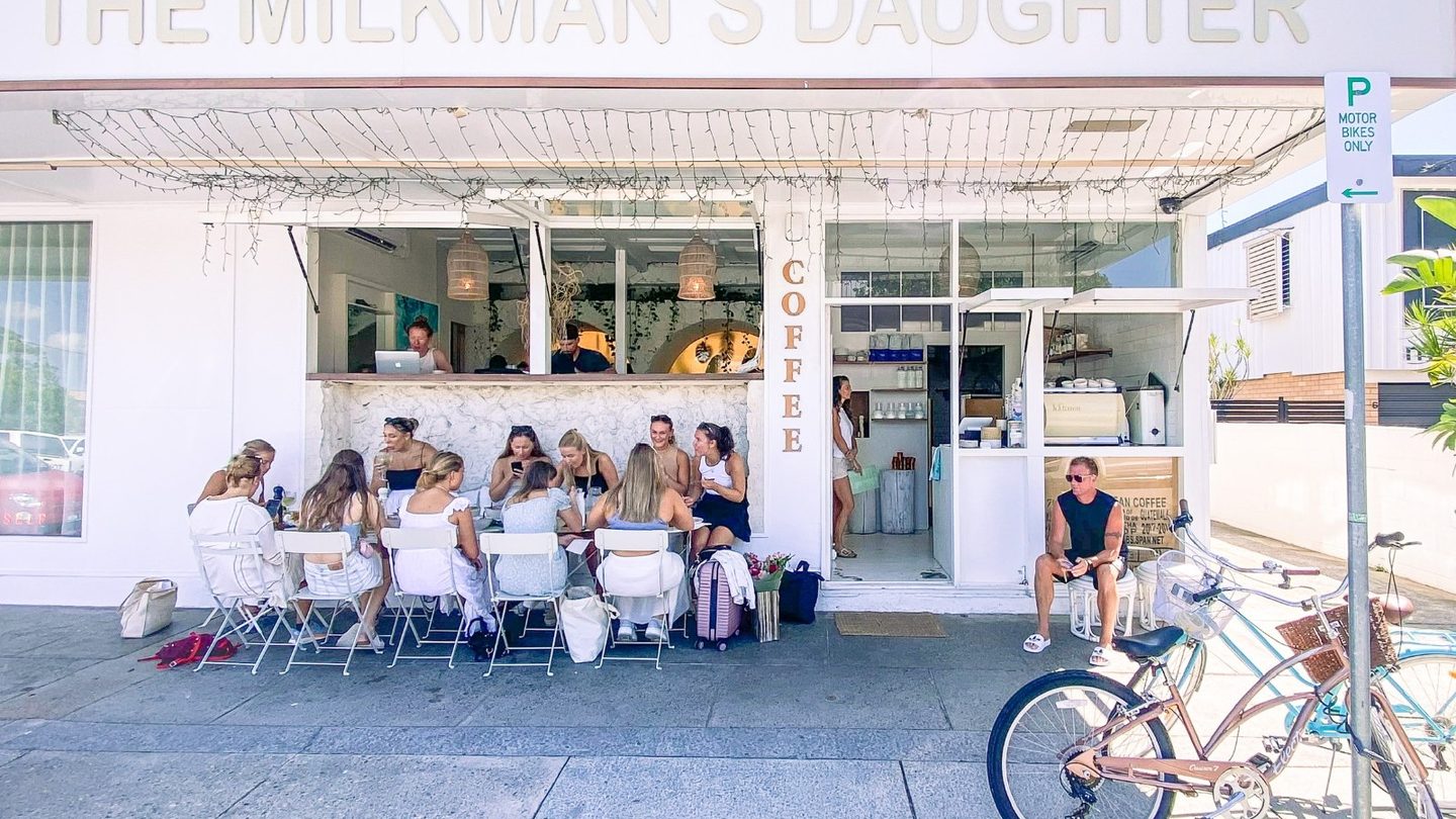 The Milkman's Daughter shopfront, with people at the outdoor tables