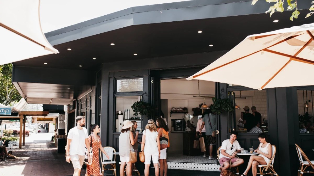 Outdoor tables under the awning at Tarte Bakery & Cafe