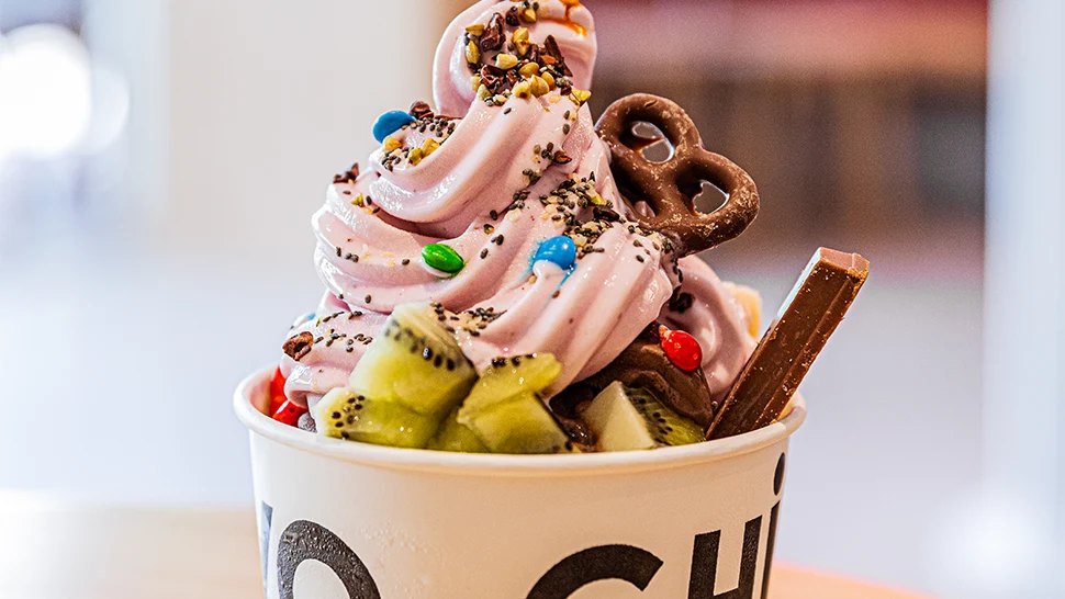 A Yo-Chi cup piled with toppings