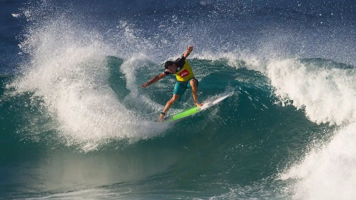 A surfer carving a wave at Snapper Rocks