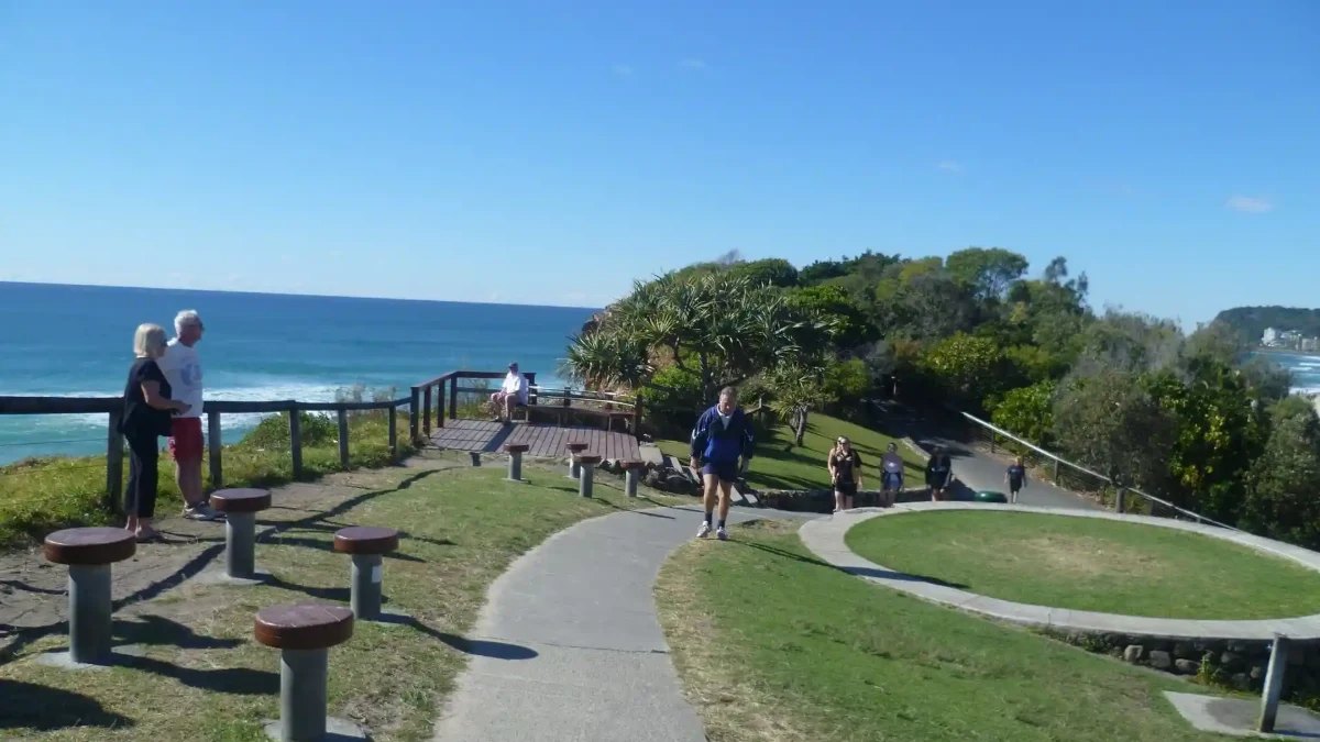 The path over the grassy headland at Mick Schamburg Park, Miami