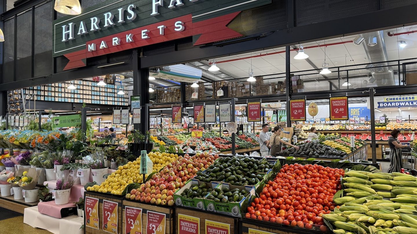 The Harris Farm Markets sign above the fruit and veg at Isle of Capri