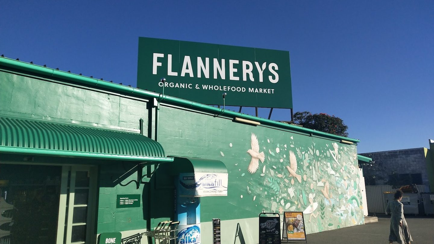 The green Flannerys building and sign in Miami