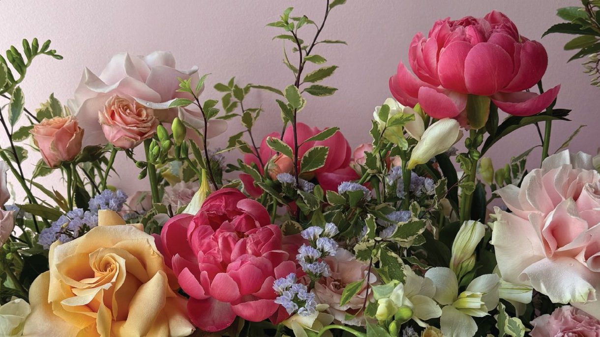 Peonies, roses and garden flowers arranged by Fleurus