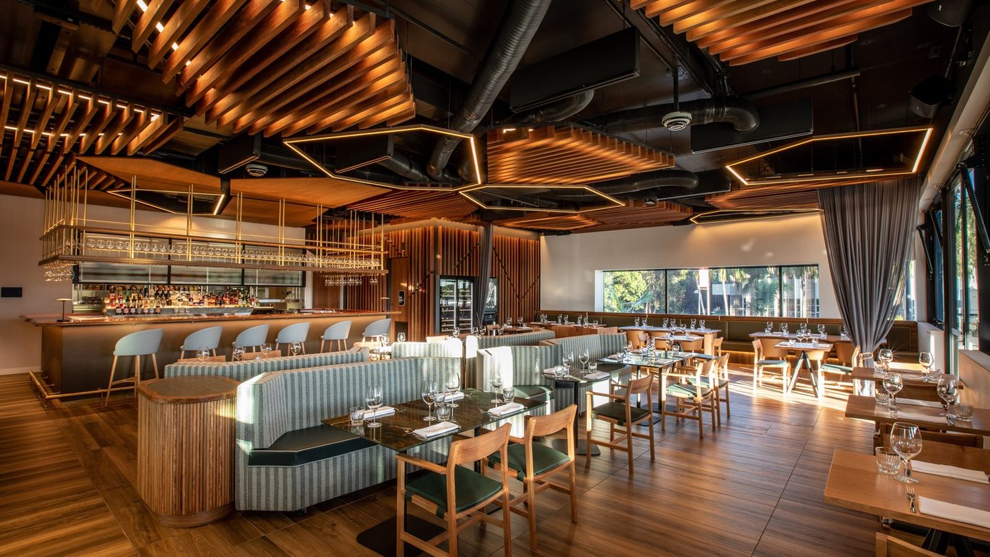 Palette's dining room under a sculpted timber ceiling