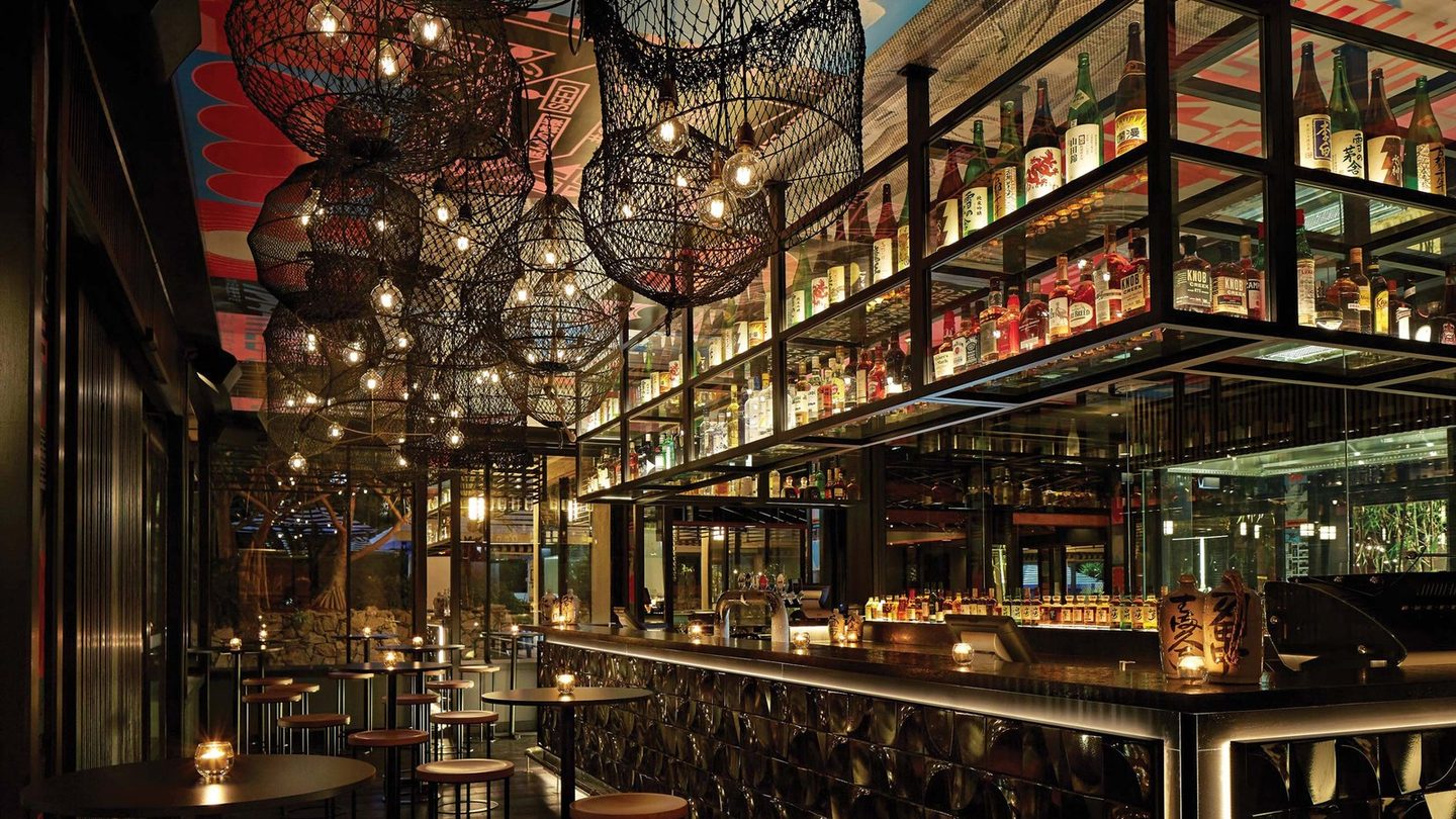 Lanterns and shelves of bottles above the bar at Yamagen