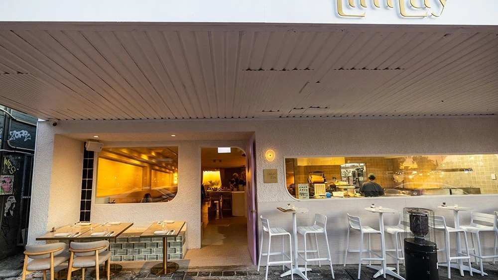 The bright white dining room and bar at Limlay Thai