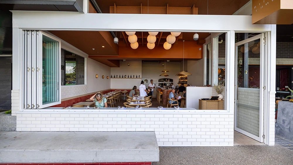 The open front of Billy Chow, with paper lanterns over the dining room