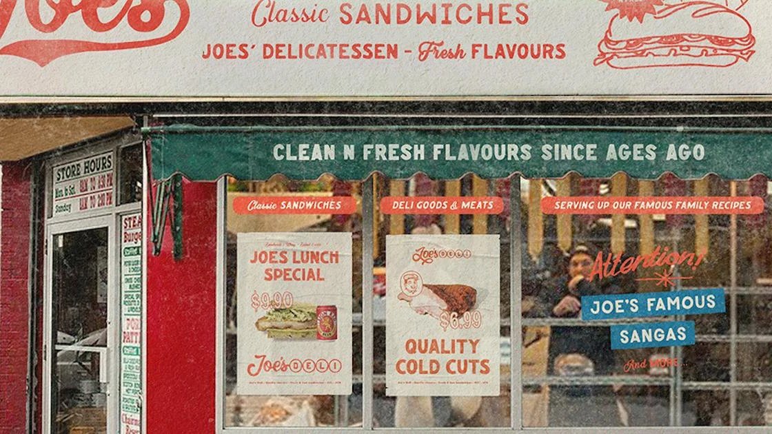 The hand-painted sandwich signs in the window of Joe's Deli