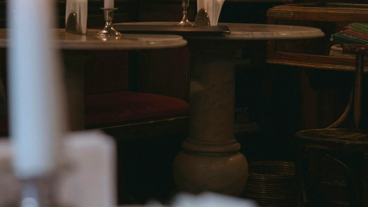 Candlelight in a dimly lit Italian restaurant