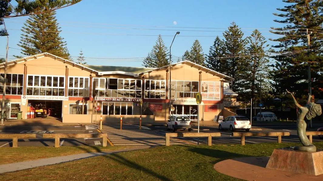The Mermaid Beach Surf Club building on Hedges Avenue, with the mermaid statue in front