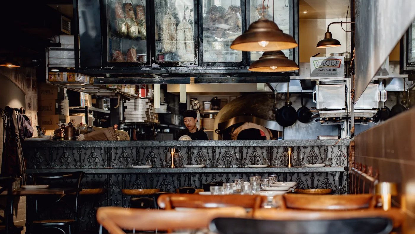 The open kitchen and dining room at Gemellini