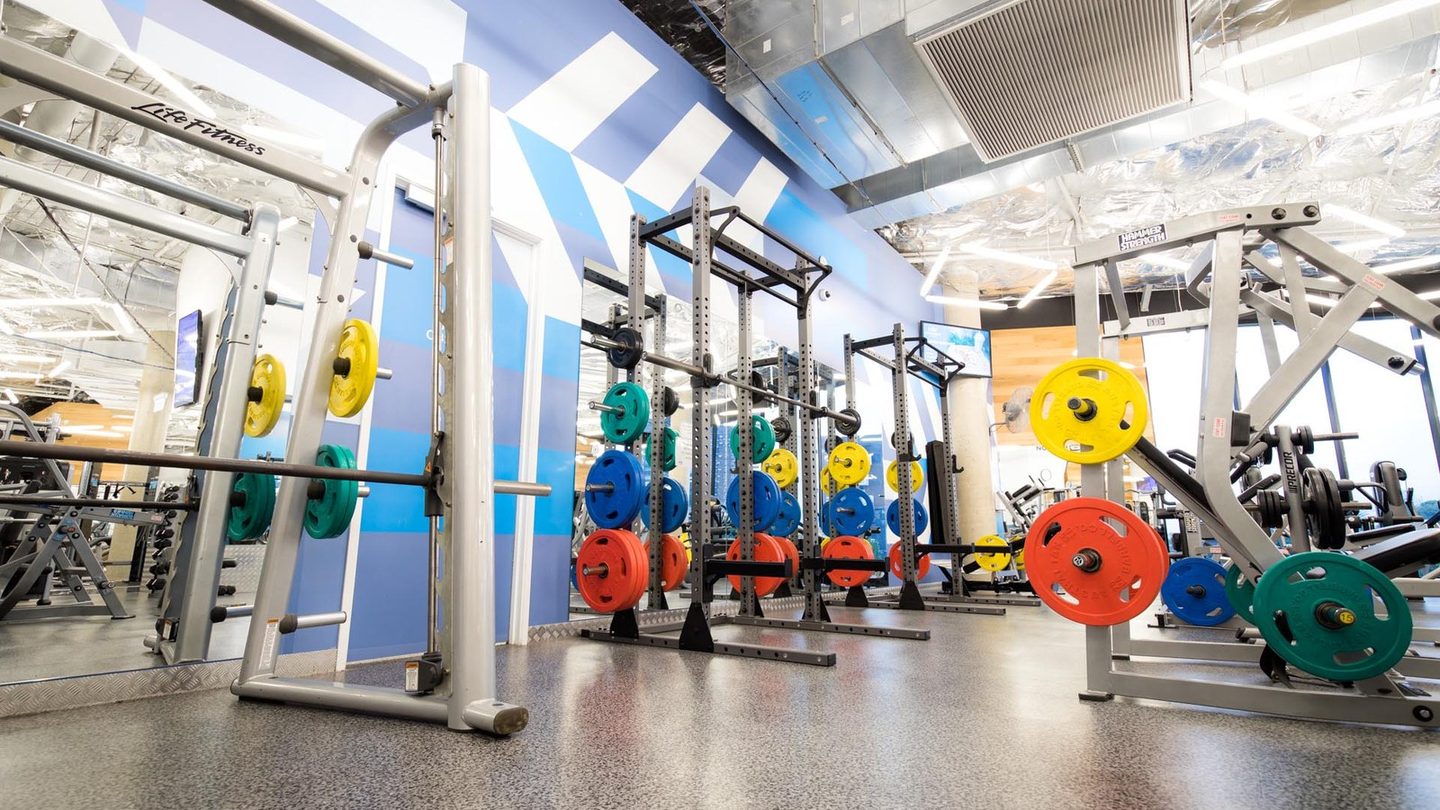 Weight racks and colourful plates at EMF Fitness Centre